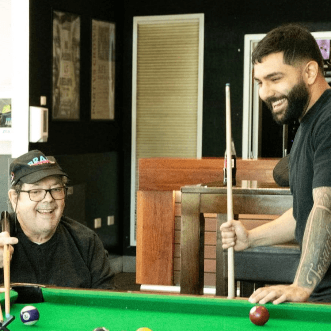 A Vana Care support worker and participant sharing a laugh in Adelaide