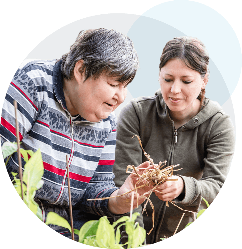 Vana Care support worker helping a participant at home
