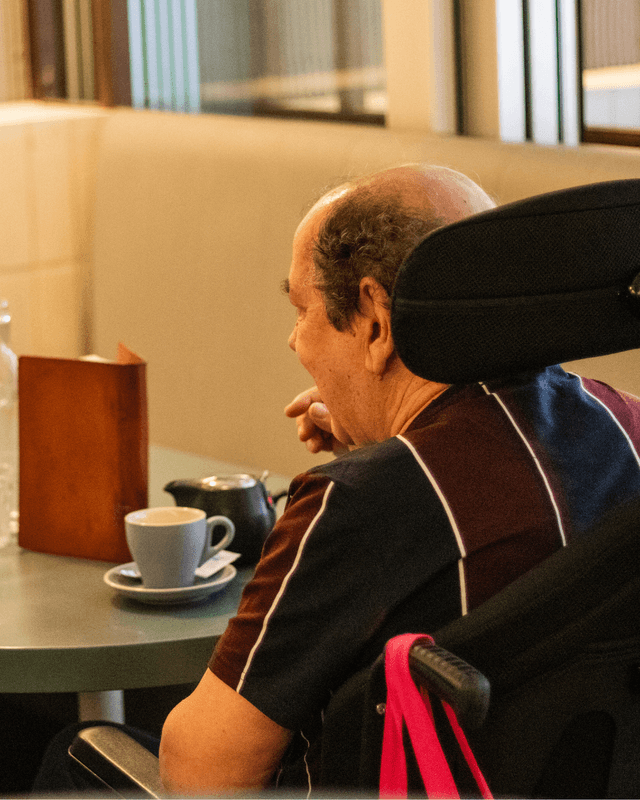 Vana Care participant living independently with support